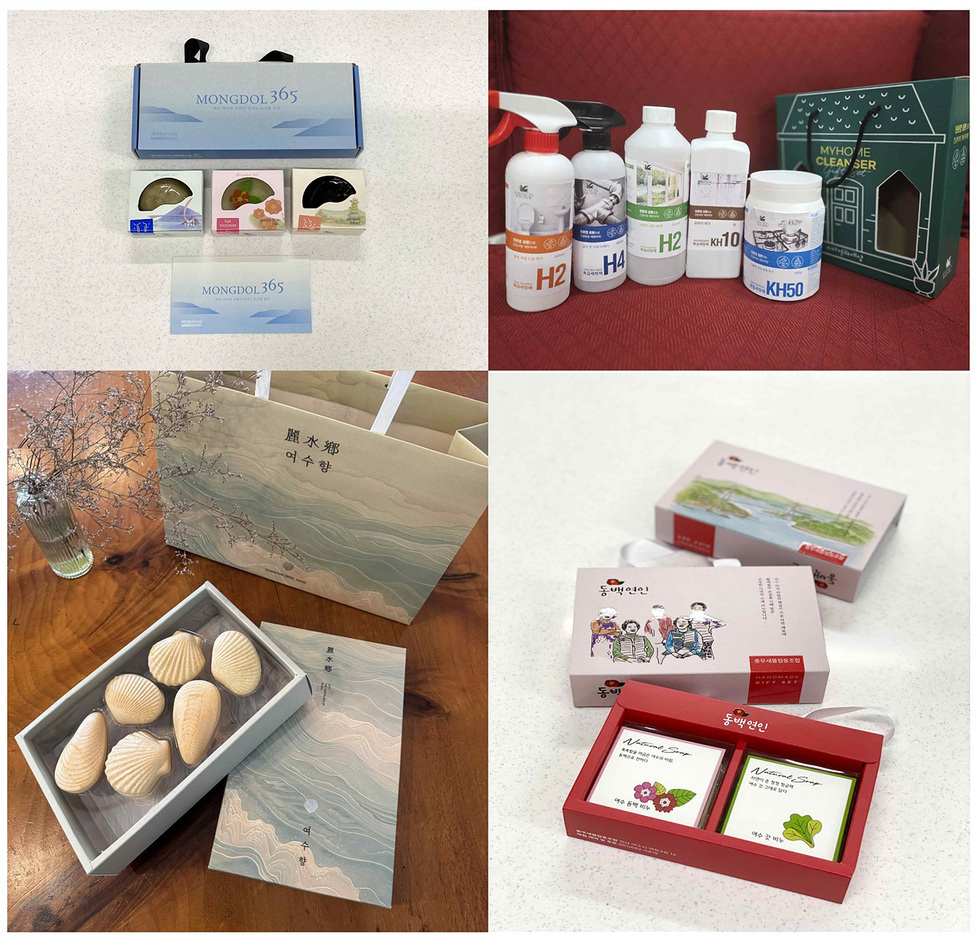 여수시의 사회적경제기업 제품 포장 디자인 개선 결과물들이 다양한 형태로 진열되어 있다. 각 제품은 소비자 중심의 디자인으로 브랜드 인지도를 높이고 있다.