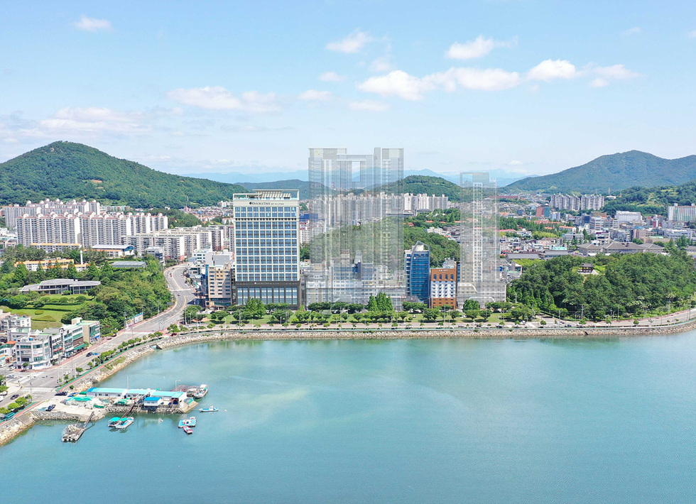 BirdseyeviewandrenderingoftheHiltonHotel1